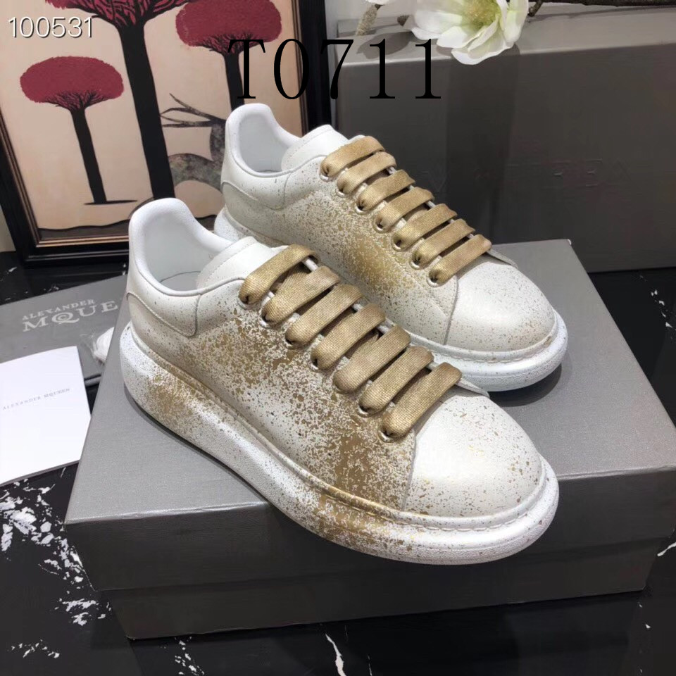 black and gold alexander mcqueen sneakers