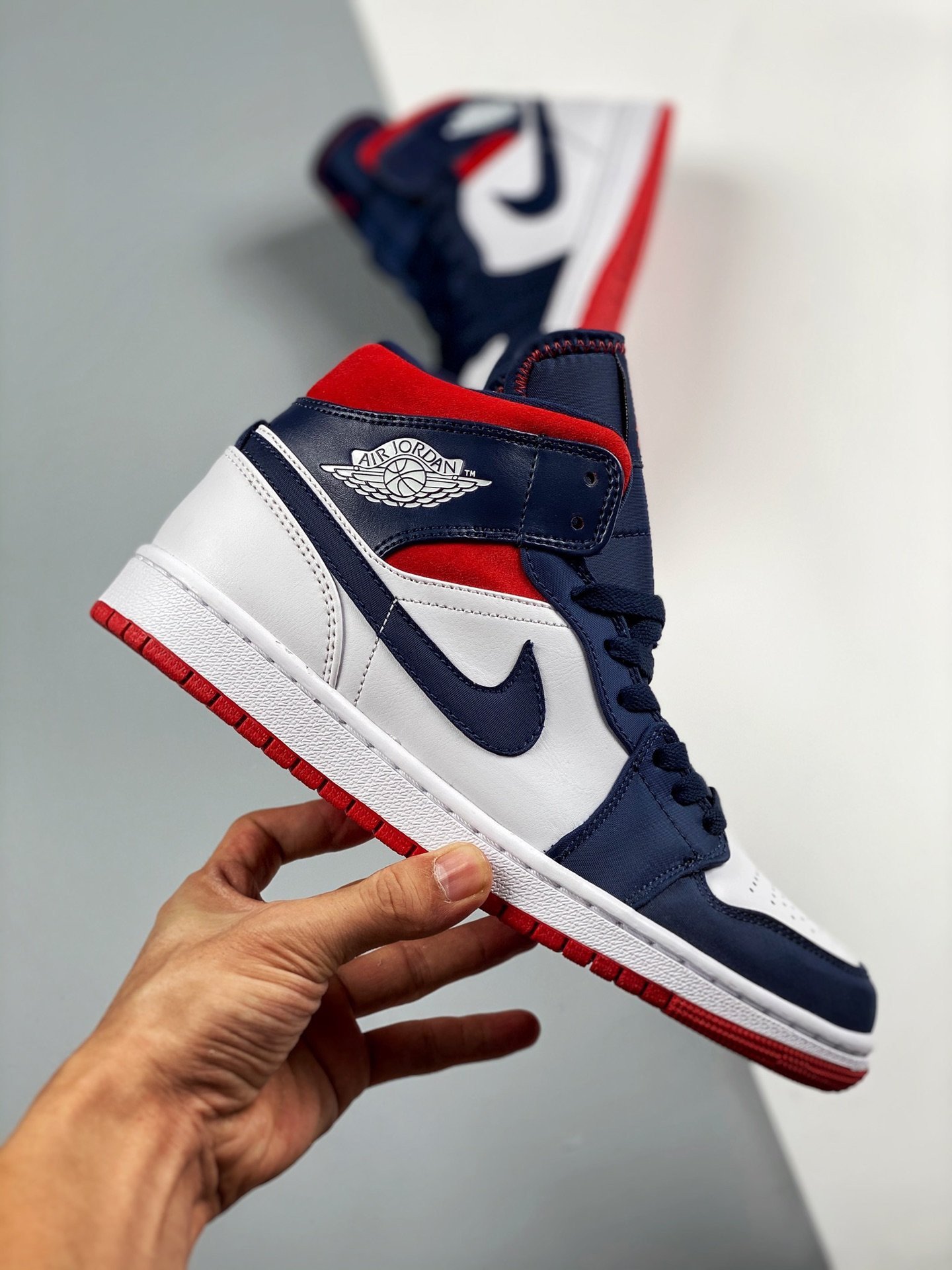 white and navy blue jordan 1