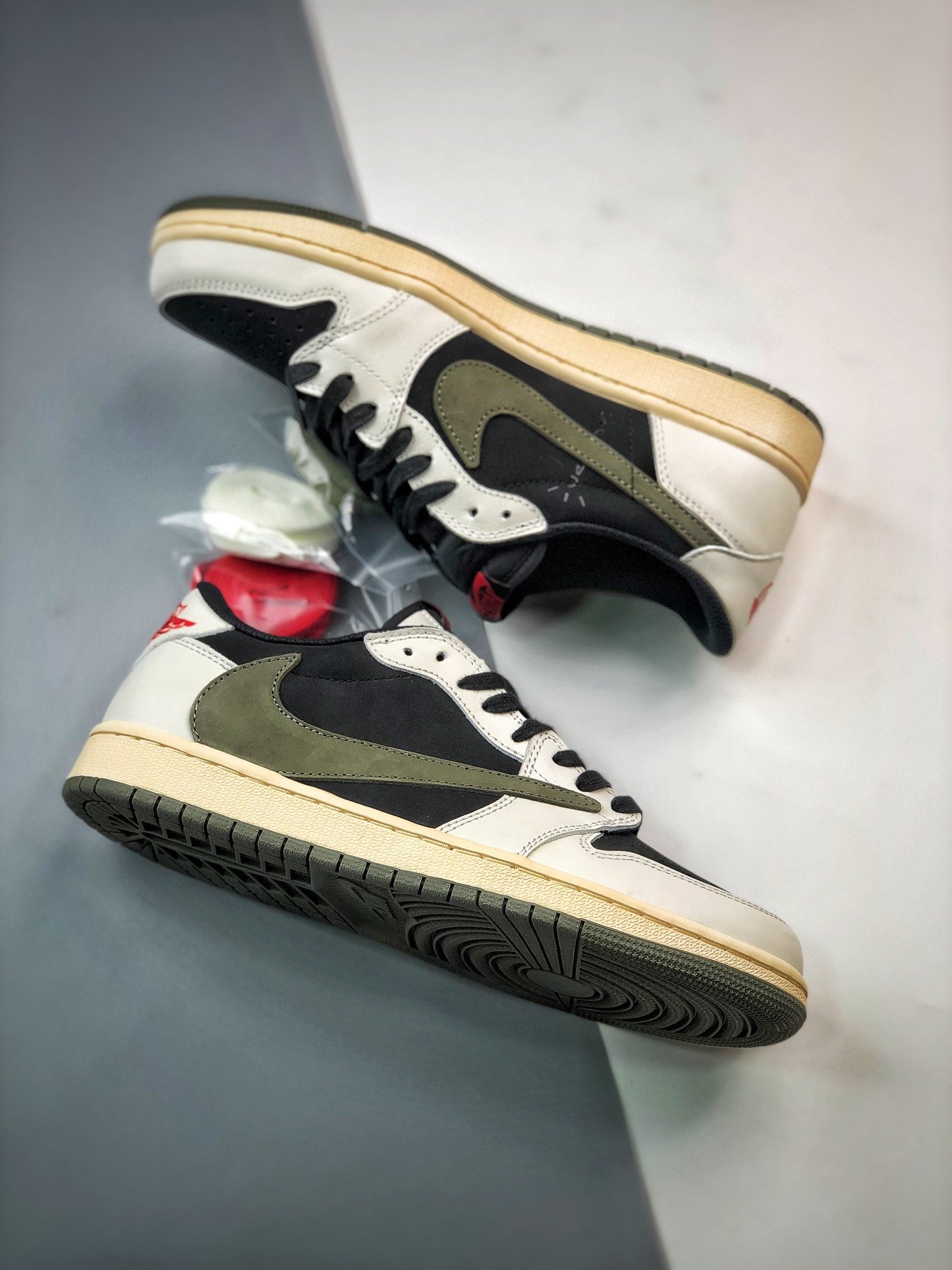 travis scott jordan 1 red and black