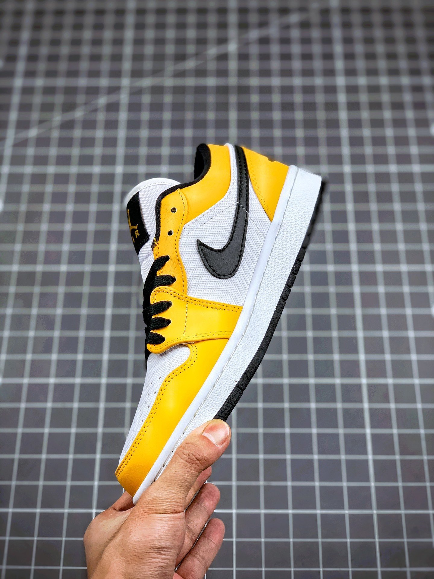 white laser orange black jordan 1